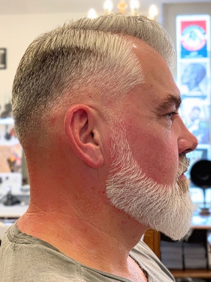 Side part Comb over + Fade + Trimmed beard